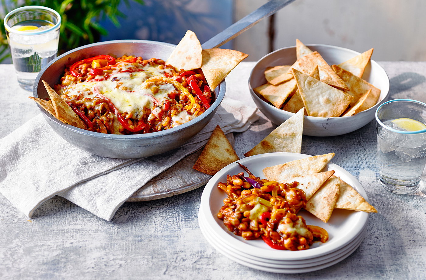 Spicy Mexican beans with tortilla nachos