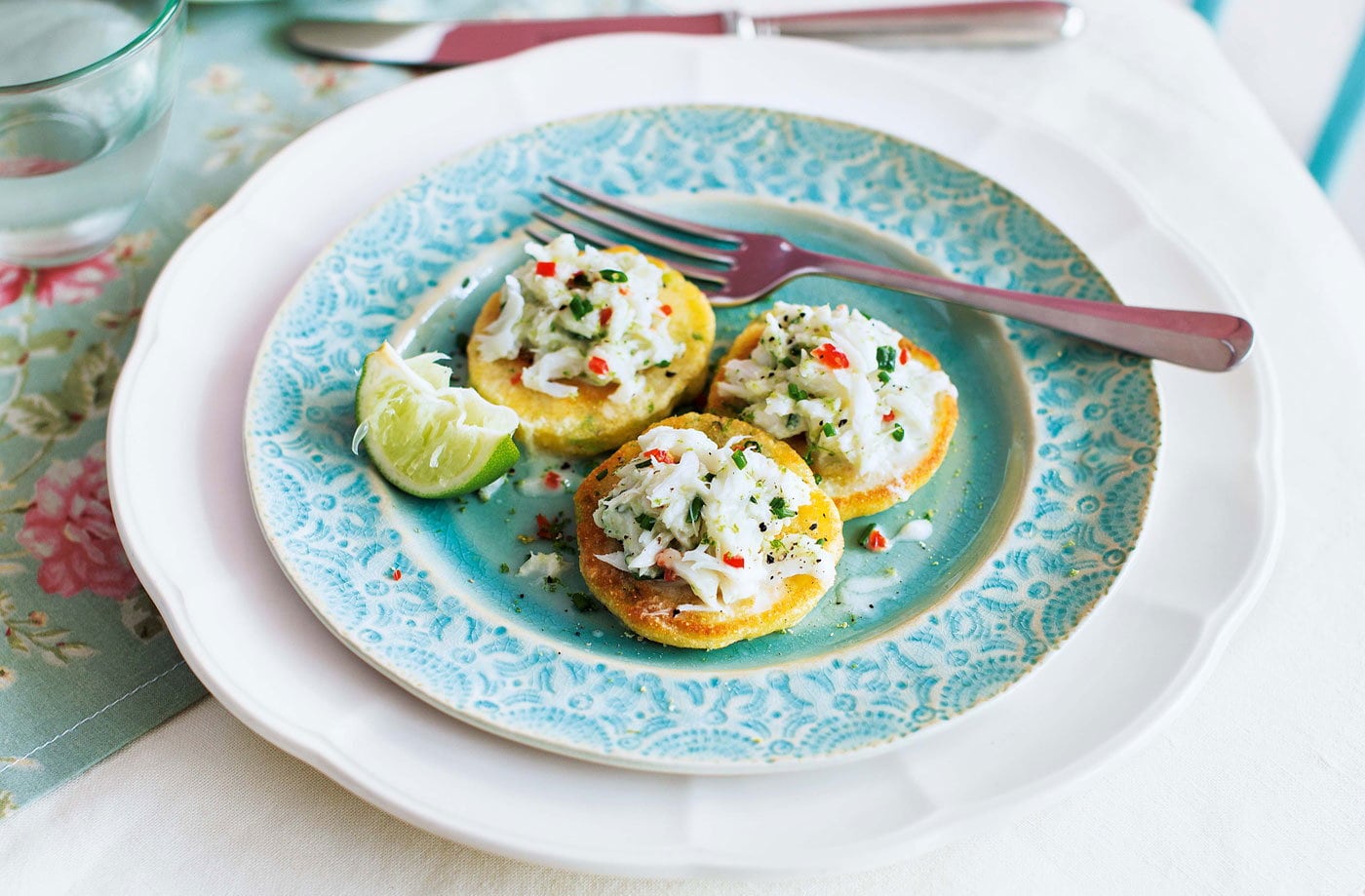 Spring onion blinis with crab and chilli