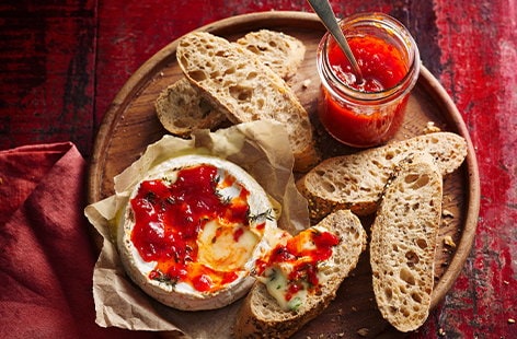 Image of "Baked camembert with thyme and chilli relish"