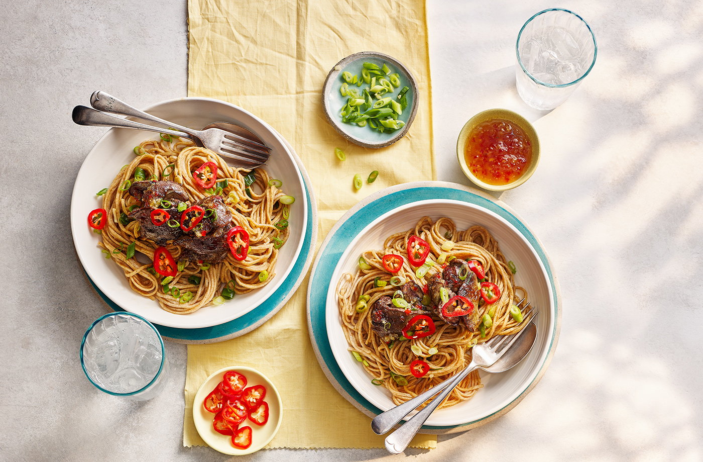 Crispy chicken livers with spring onion noodles