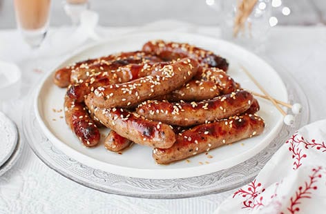 Image of "Chipolatas with plum jam and sesame seeds"