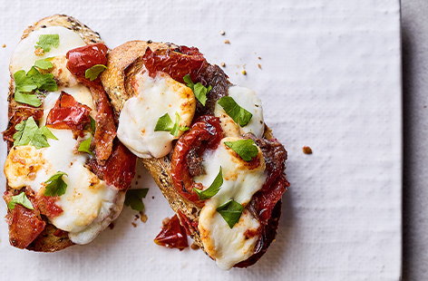 Image of "Melty mozzarella and roasted tomato toast"