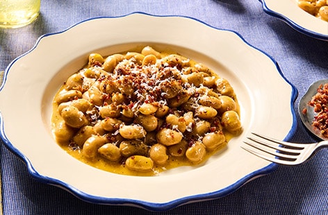 Image of "Butter bean carbonara with bacon crumb"