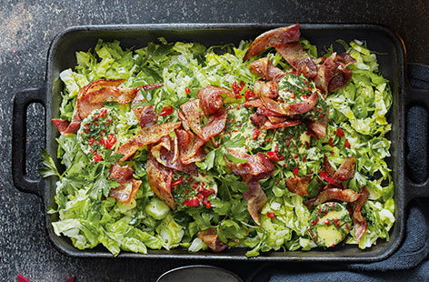 Image of "Shredded sprouts with bacon and chilli butter"