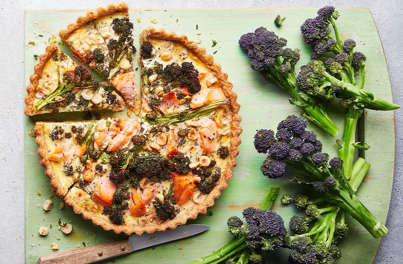 Purple sprouting broccoli, salmon and hazelnut tart