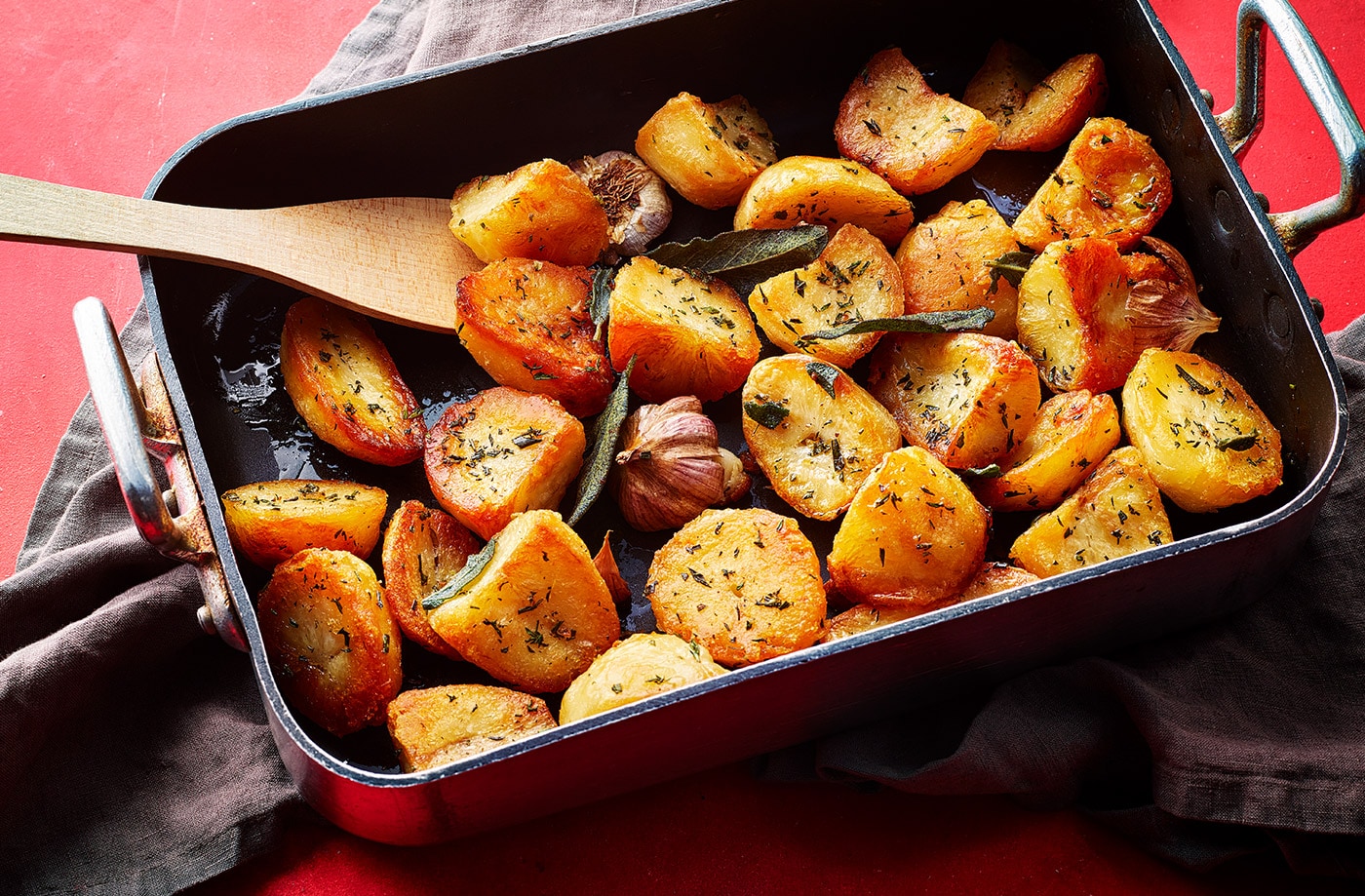 Herby triple-cooked roasties