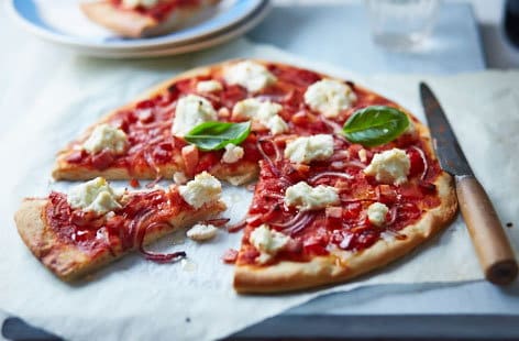 Image of "Leftover pizza with ham, ricotta and basil"