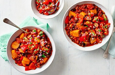 Image of "Sweet potato and black bean chilli bowls with cherry tomato salsa"