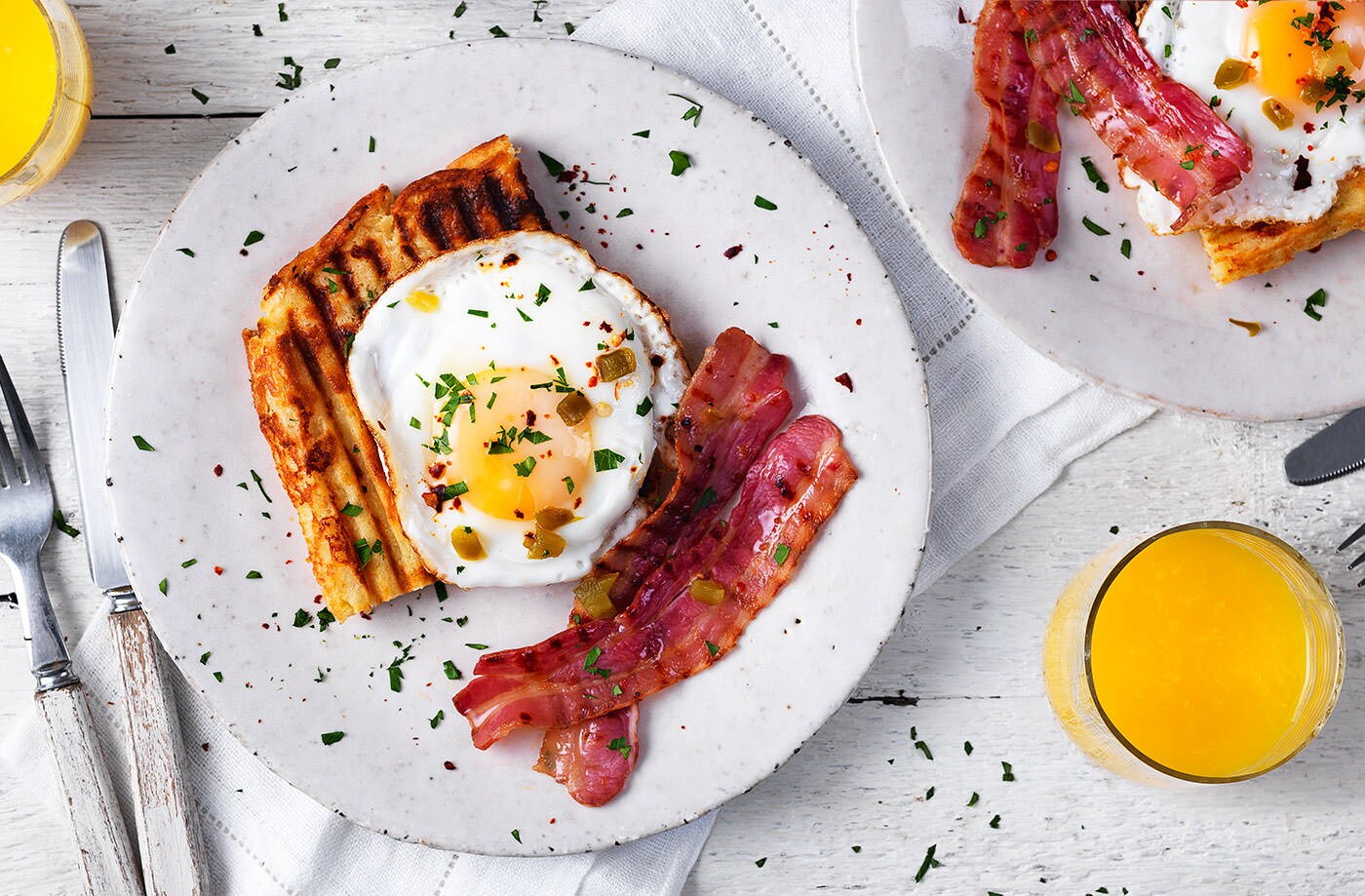 Jalapeño and cheese waffles with bacon and eggs 