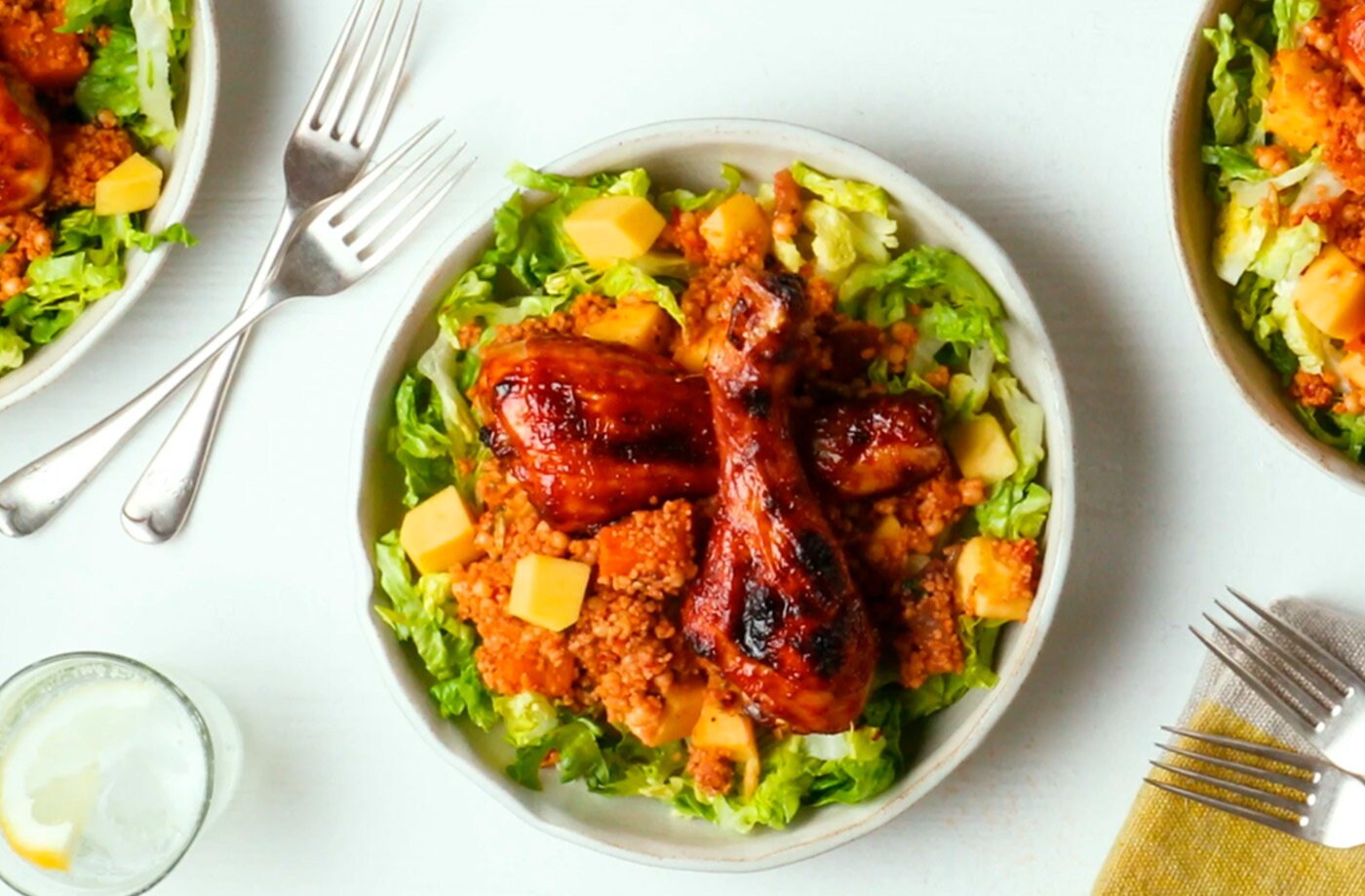 Sticky chicken drumsticks with mango couscous