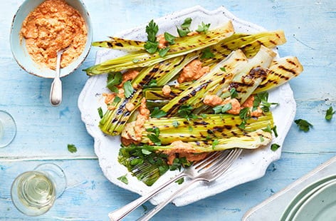 Image of "Charred leeks with romesco sauce "