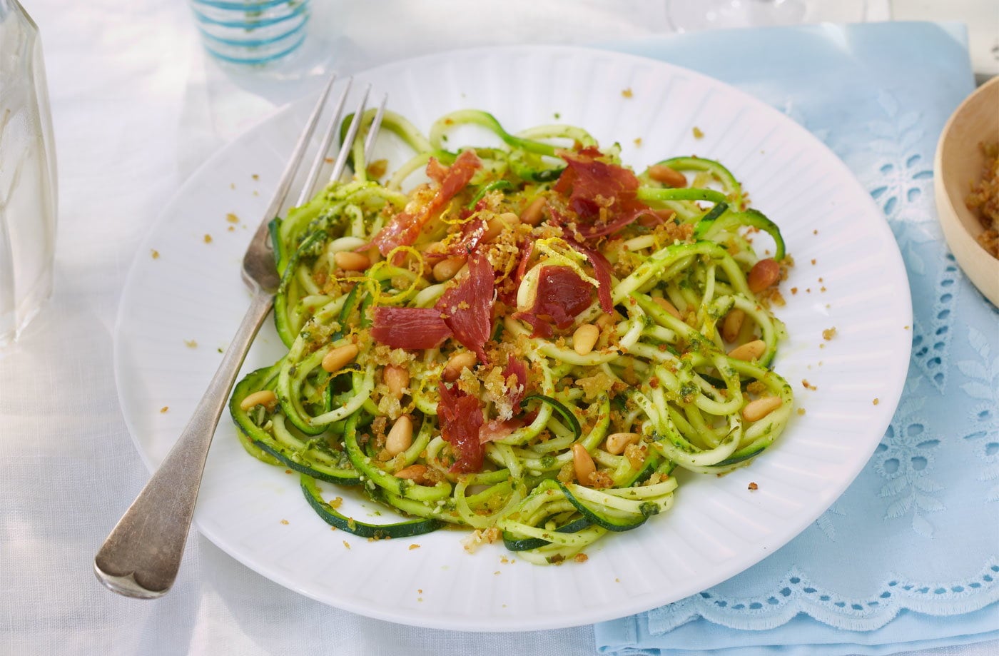 Courgetti with pesto, Parmesan crumbs and Parma ham