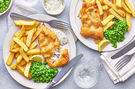 Image of "Beer-battered fish with mushy peas"