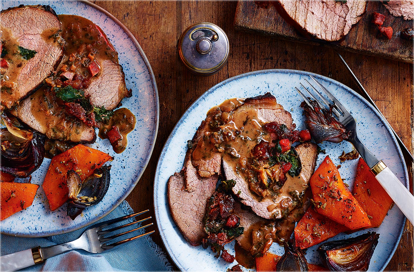 Chorizo-stuffed beef with roasted garlic sauce