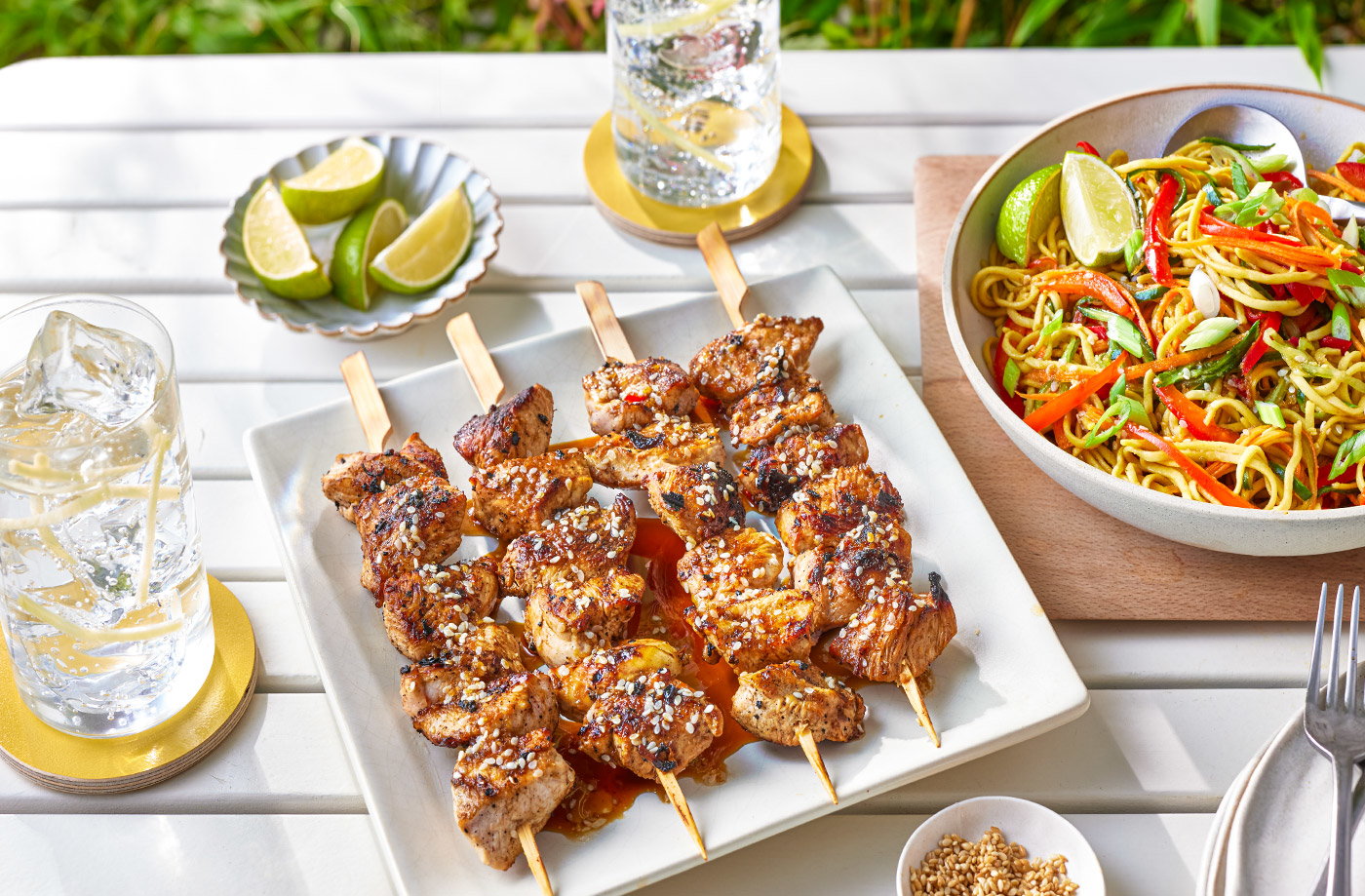 Sticky chicken skewers with noodle salad