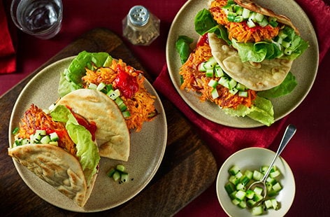 Image of "Chilli carrot fritter burgers with cucumber relish"