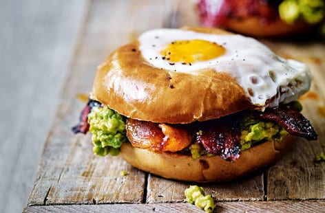 Image of "Egg in a hole with spicy bacon and guacamole"