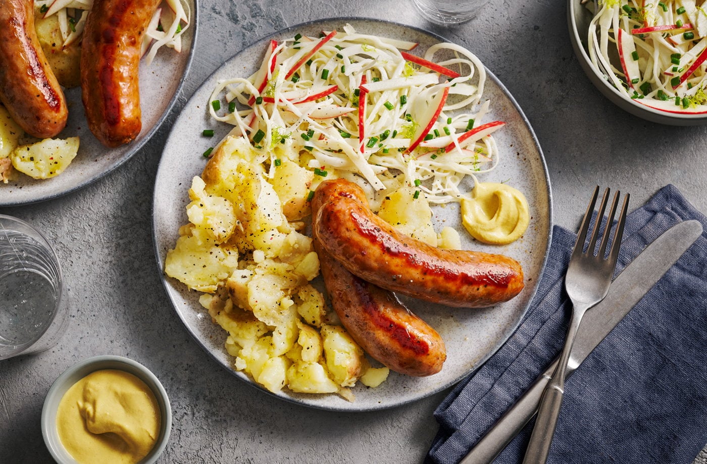 Sausages with fennel, apple and cabbage slaw