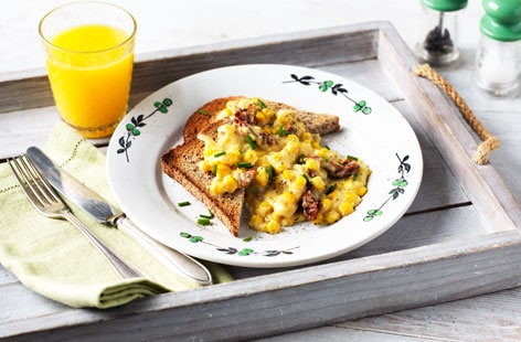 Image of "Creamed sweetcorn on wholemeal toast with chives and sundried tomatoes"