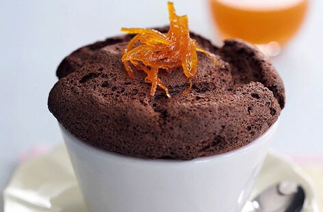 Image of "Chocolate soufflés with orange and cardamom sauce"