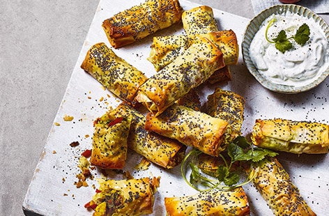 Image of "Curried potato, pepper and spring green rolls"