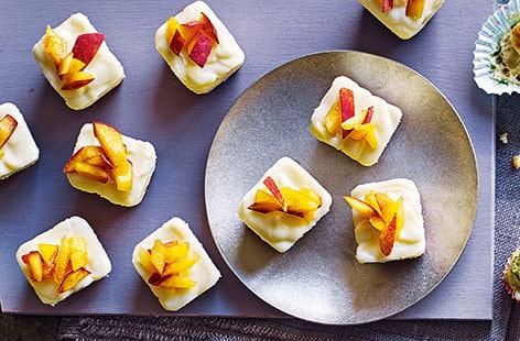 Image of "White chocolate and peach cheesecake cubes"