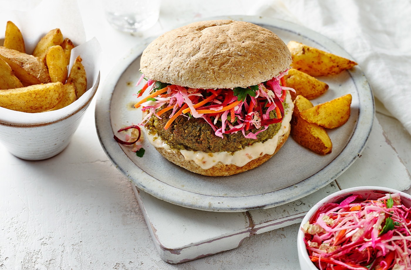 Spicy edamame burgers with lime slaw