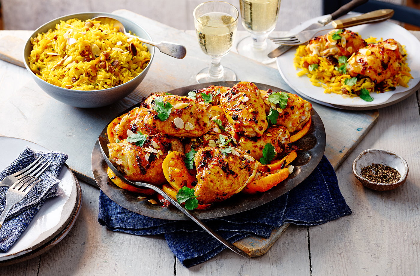 Harissa and orange chicken thighs with spiced rice