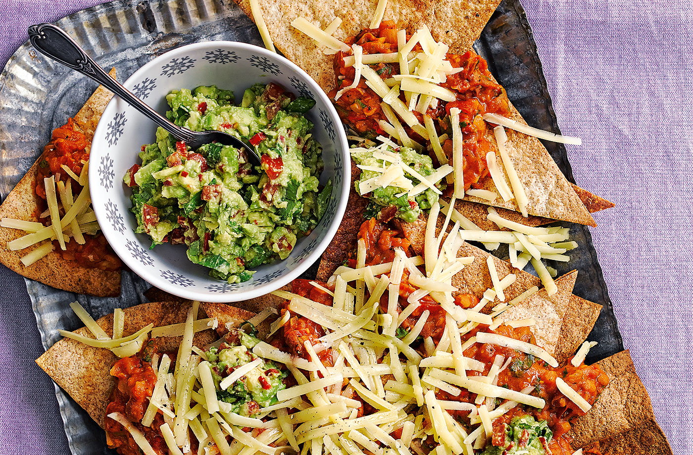 Nachos with beans and avocado salsa