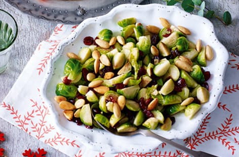 Image of "Sautéed sprouts with almonds and cranberries"