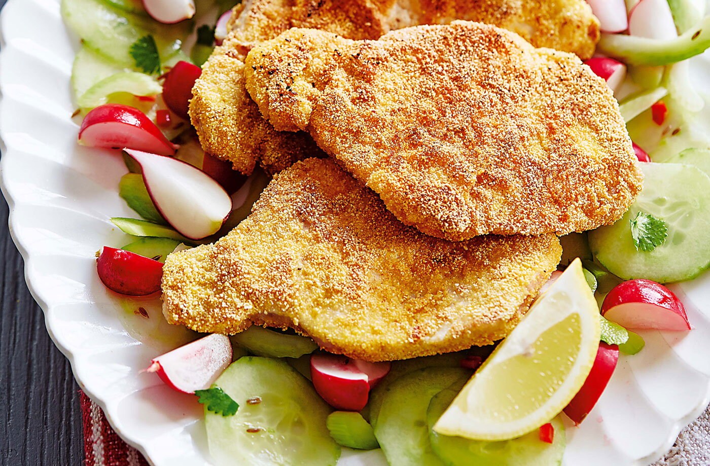 Pork schnitzel with spiced cucumber salad