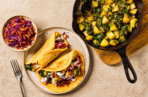 Image of "Red lentil dosa pancakes with potato and spinach"