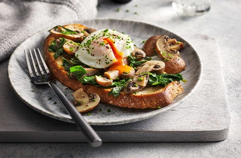 Image of "Microwave poached eggs with soy butter mushrooms"