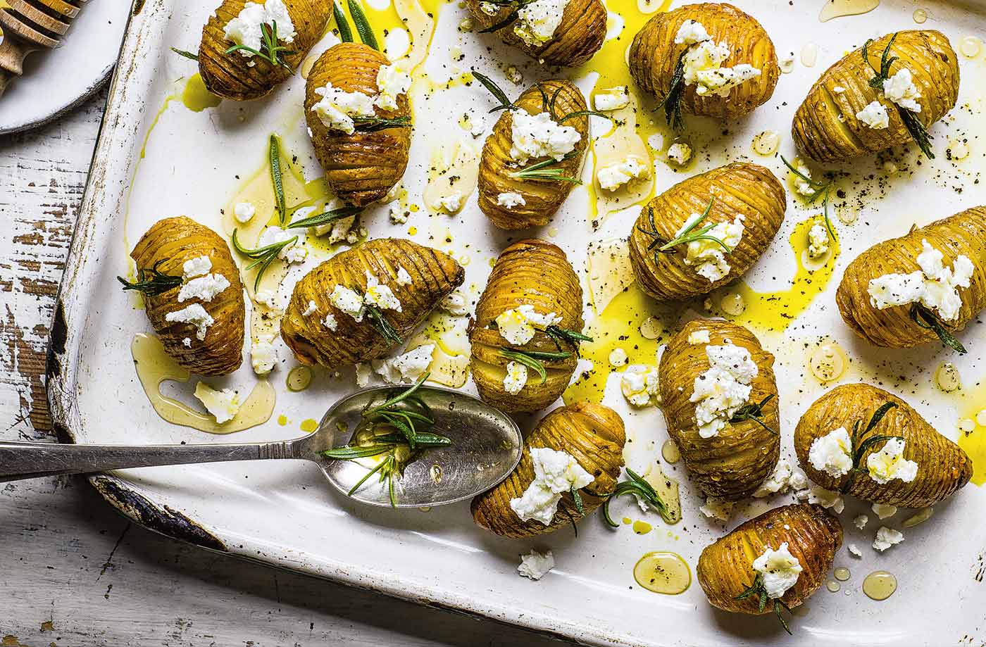 Hasselback potatoes with goat's cheese and honey