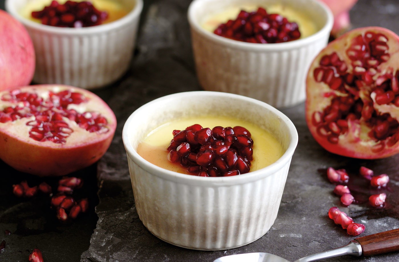 Custard pots topped with pomegranate