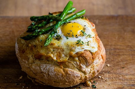 Image of "Eggs in a basket with chorizo and mushroom sauce"