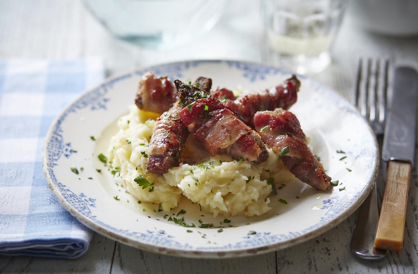 Stuffed lamb's liver wrapped in bacon with olive oil mash
