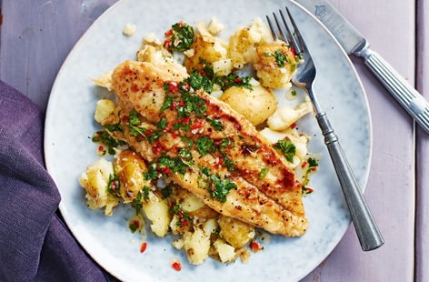 Image of "Pan-fried basa fillets with garlic potatoes"