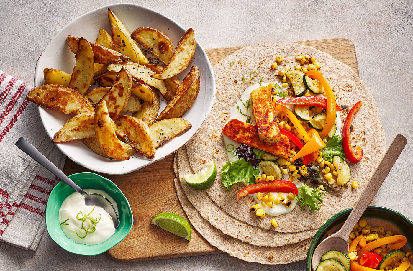 Charred sweetcorn, pepper and halloumi wraps
