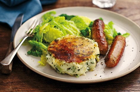 Image of "Bubble and squeak cakes with sausages"