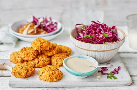 Image of "Lentil kofte with tahini sauce and red cabbage salad"