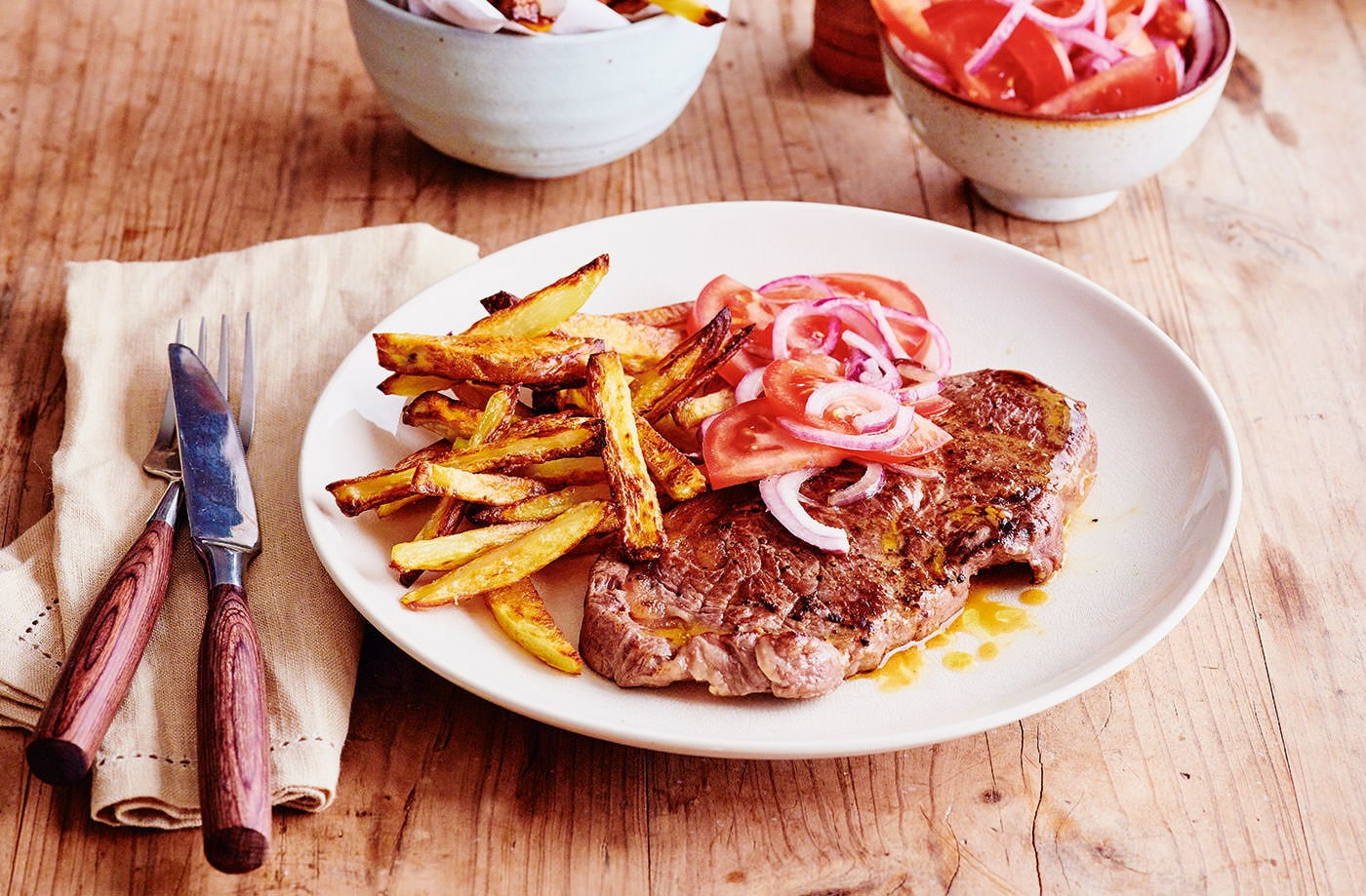 Steak and chips with salsa