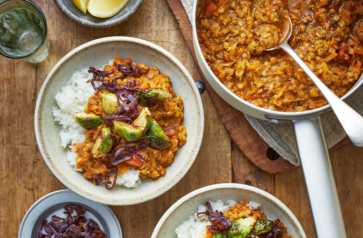 Red lentil and carrot dhal with spiced sprouts