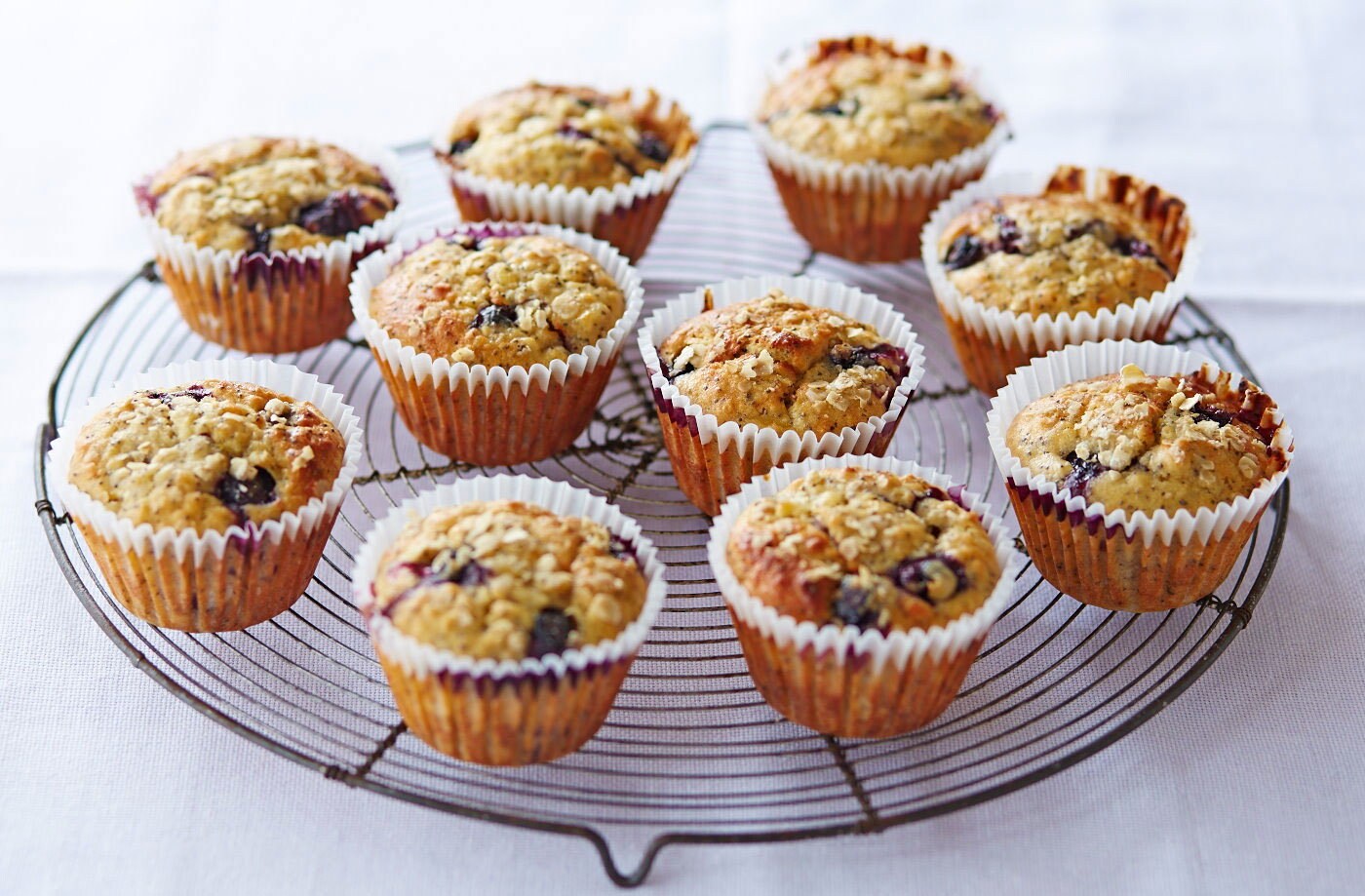 Zesty ginger and berry poppy seed muffins
