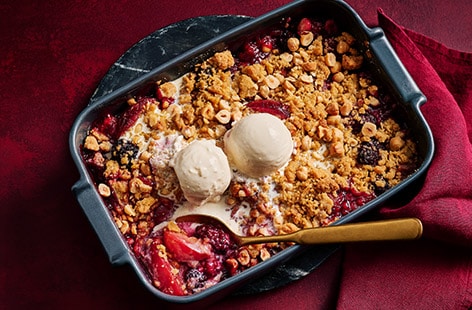 Image of "Mulled plum and blackberry crumble"