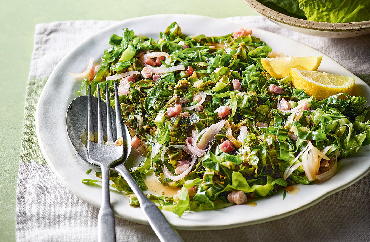 Braised spring greens with bacon