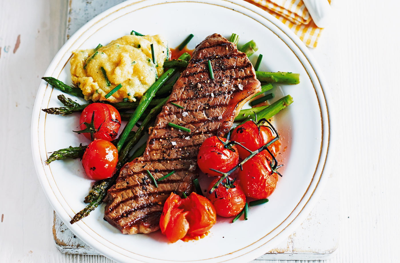 Steak with cheese and chive polenta