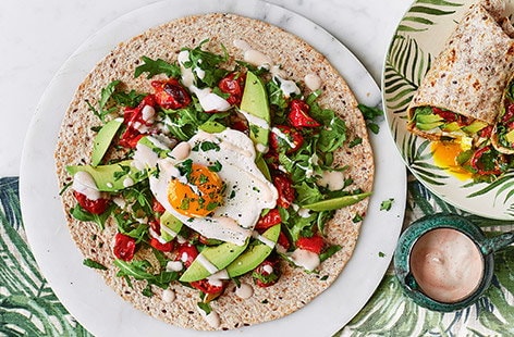 Image of "Avocado and egg breakfast burrito"