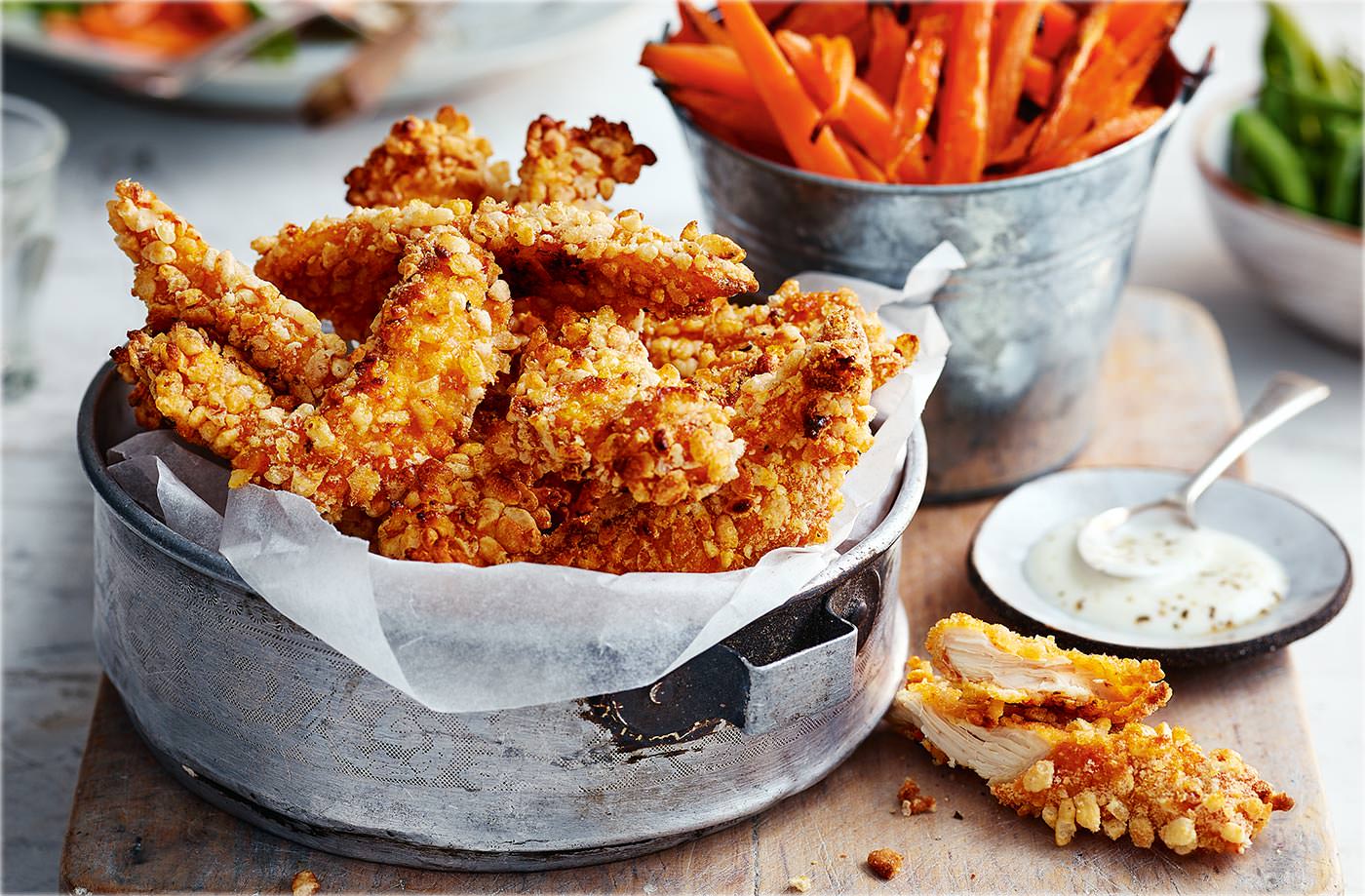 Crunchy chicken goujons with carrot 'fries'