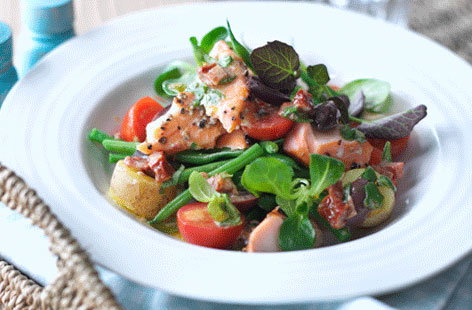 Image of "Salmon Niçoise with sun-dried tomato dressing"